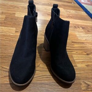 Black heeled zip up ankle boots